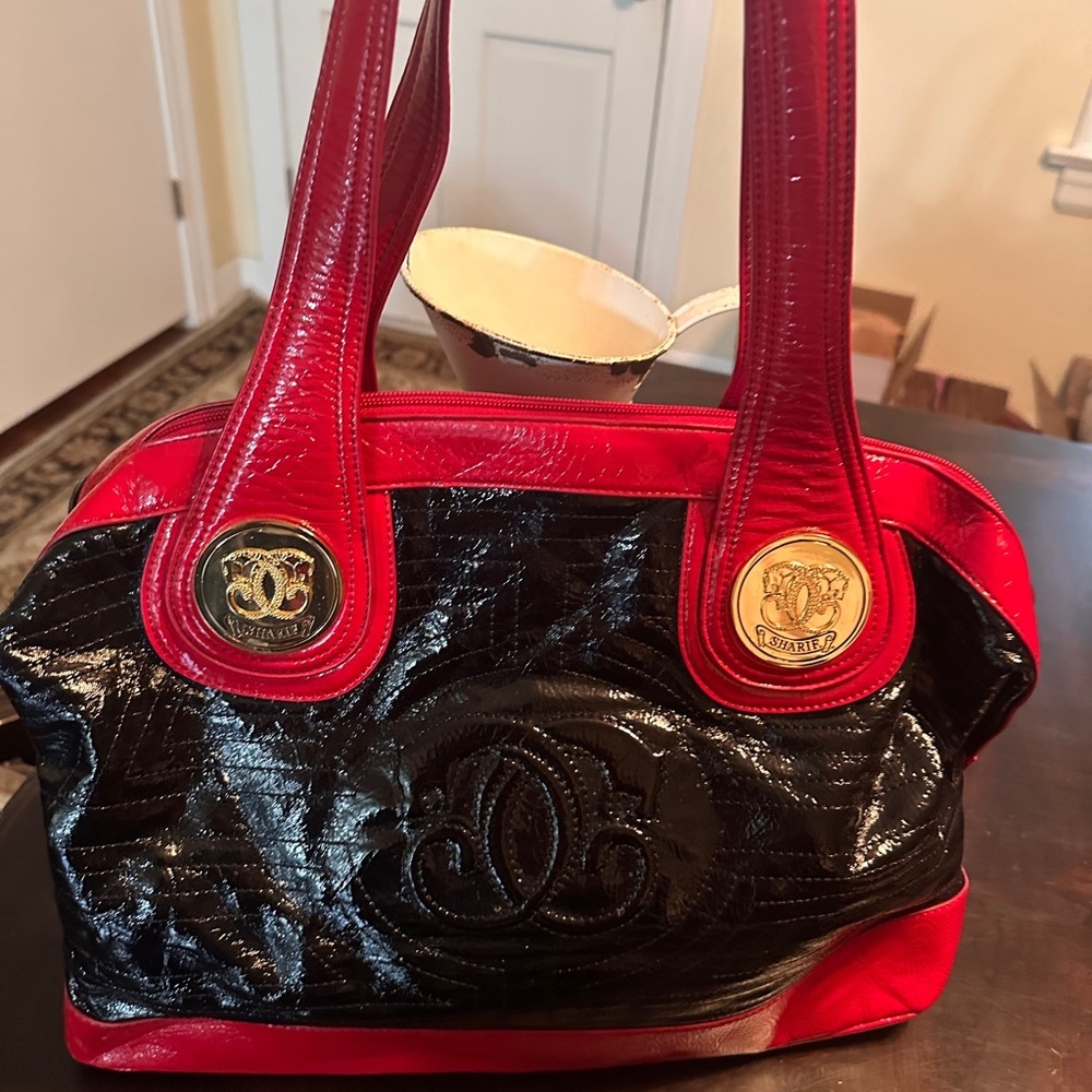 Sharif Red and Black Patent Shoulder Bag with Gold Medallions